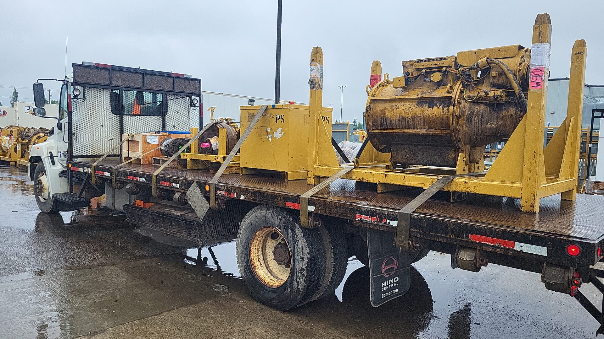 Kandys Express flat deck hauling heavy industrial equipment